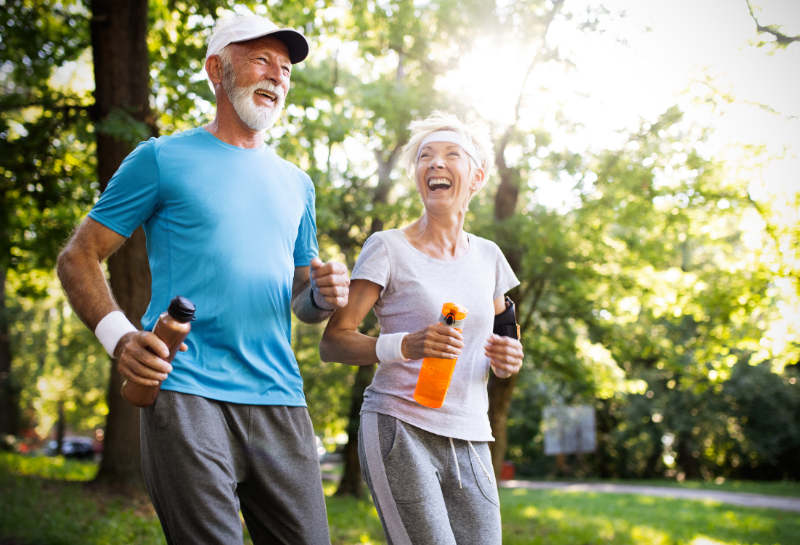 healthy elderly couple walking