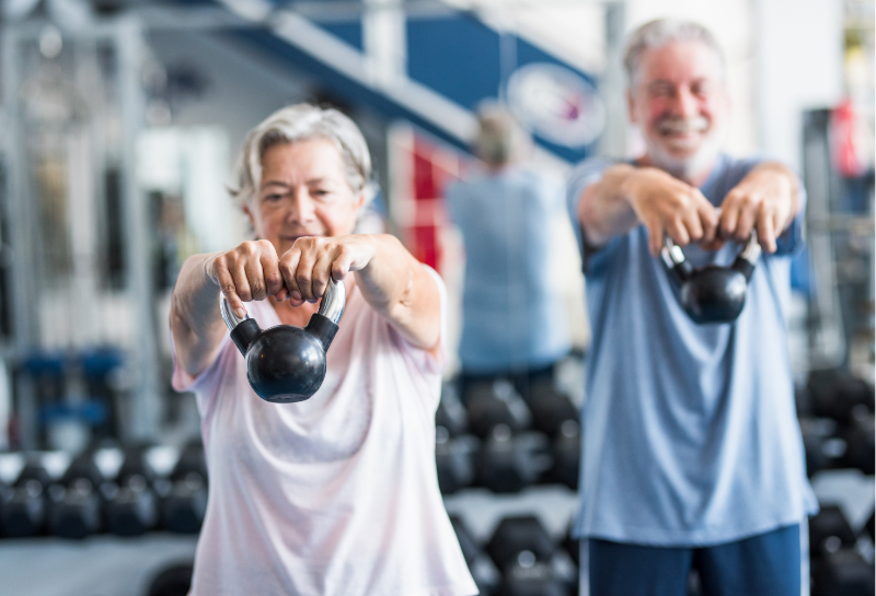 senior couple doing resistance training