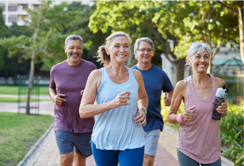 Older adults exercising outdoors to maintain strength, mobility, and independence after 60.